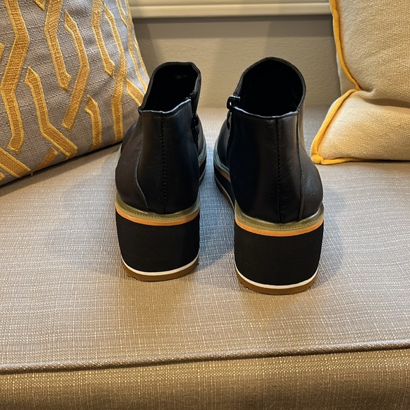 Black faux leather boots. - Picture 3 of 5